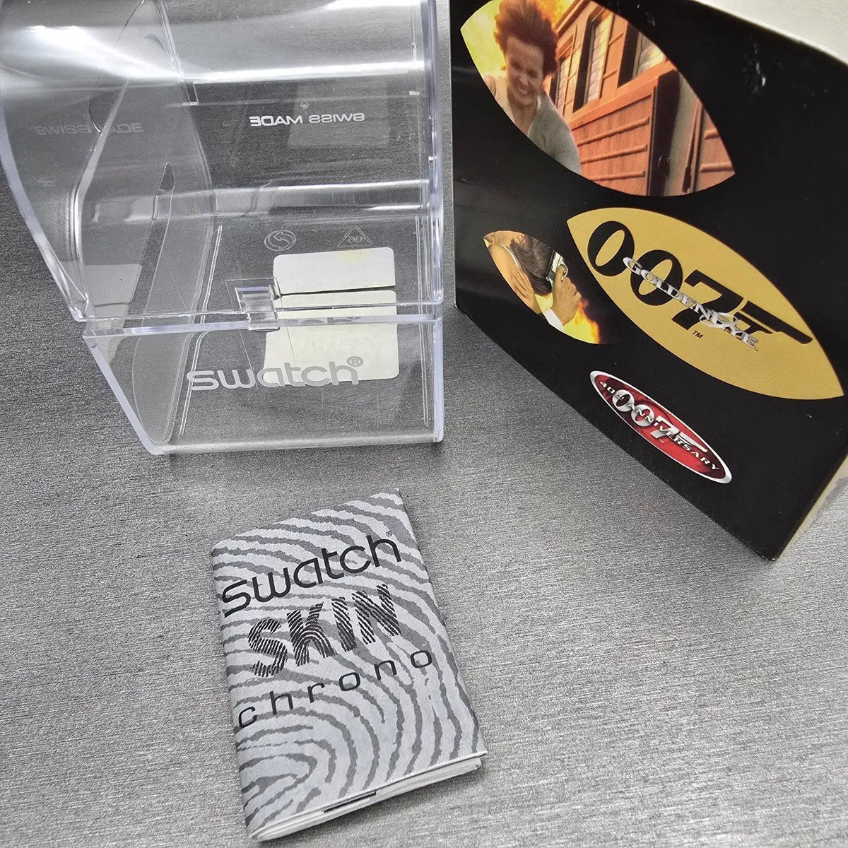 Swatch Chrono James Bond GoldenEye Watch Men 37mm Gold Dial SUYB102 New Batt NOS10