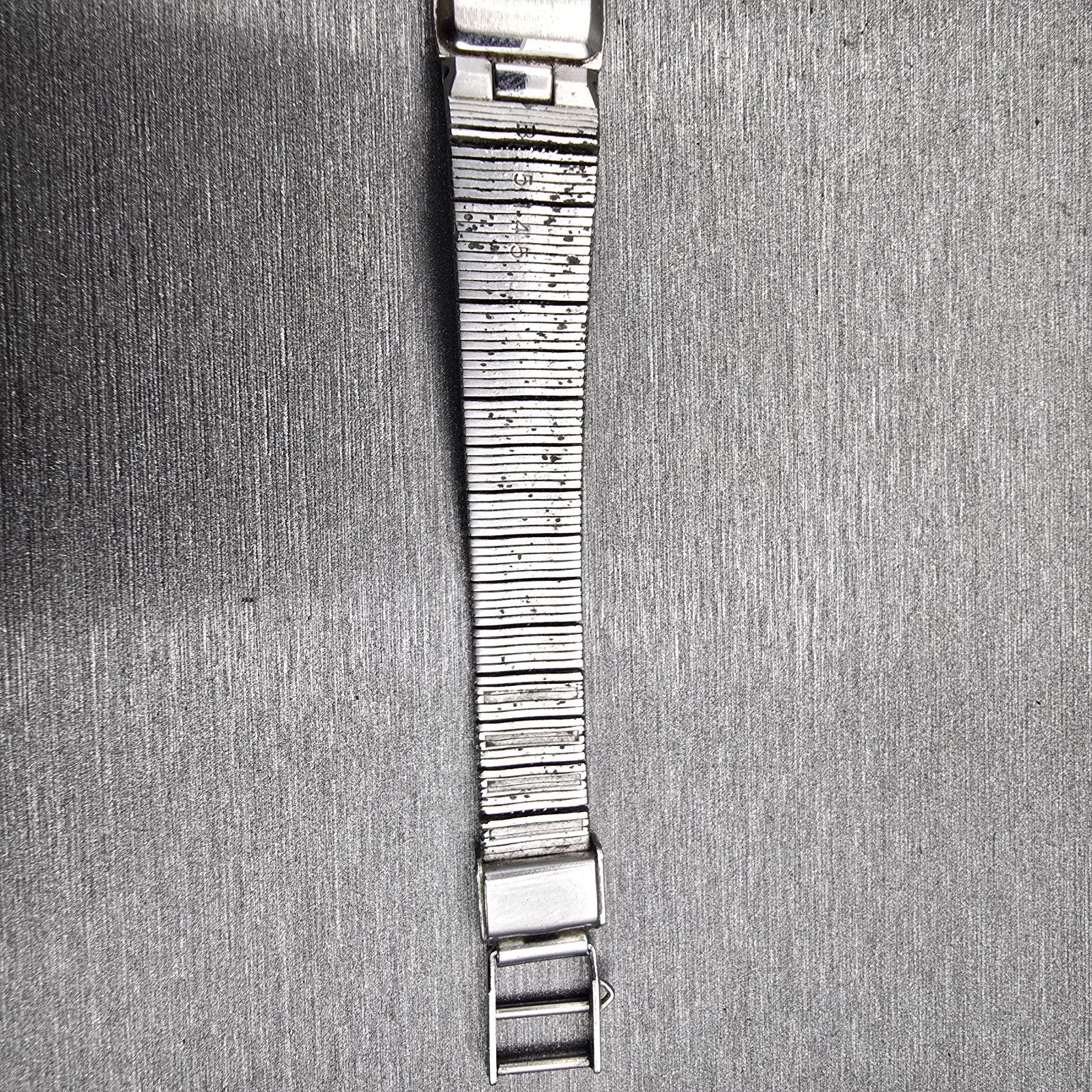 Seiko Watch Women 12mm Silver Dial Silver Tone Rectangle 2E20-5029 New Battery12