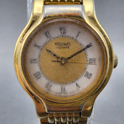 Seiko Watch Women 19mm White Dial Gold Tone Round V4010289 New Battery1