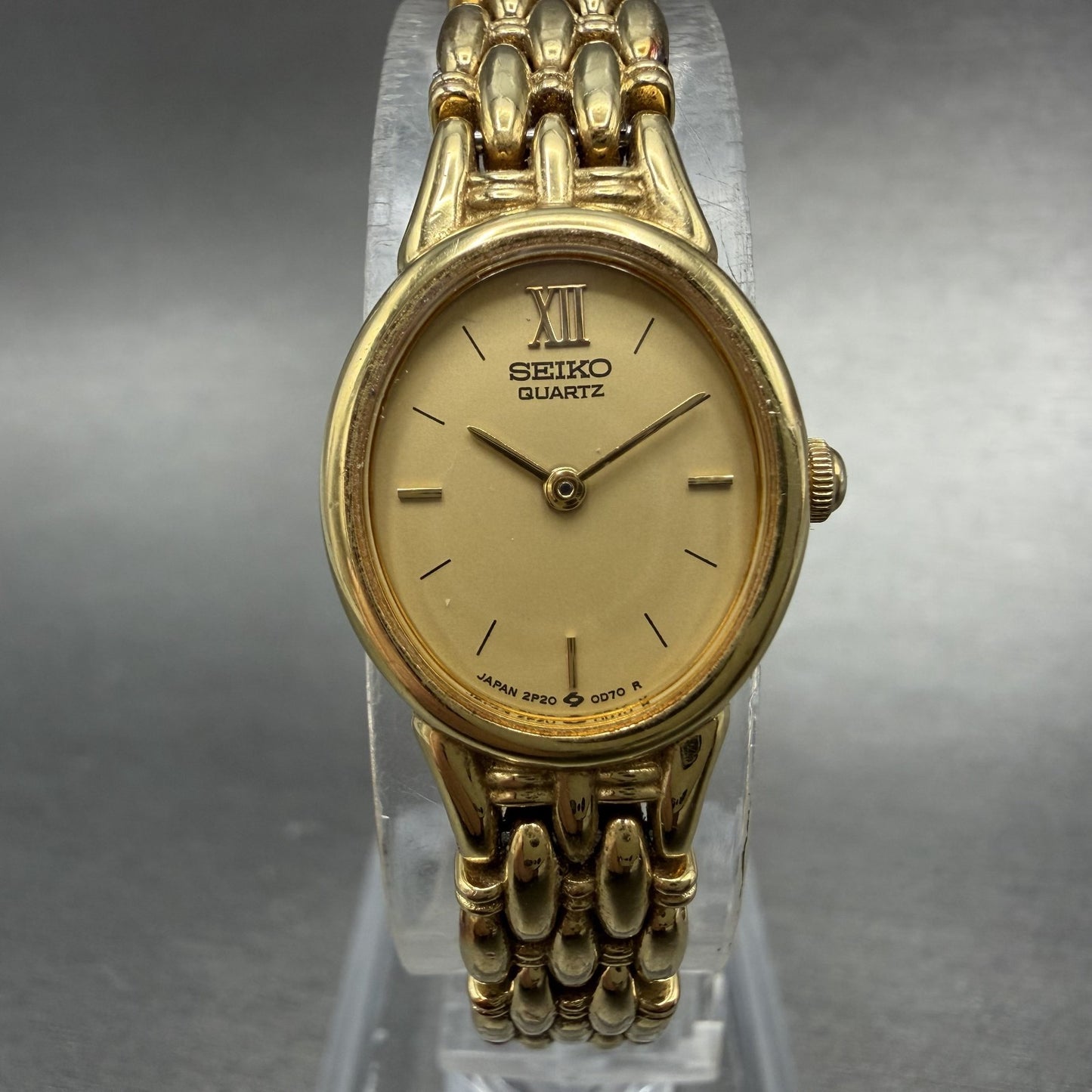 Seiko Watch Women 17mm Champagne Dial Gold Tone Oval 2P20-5B09 New Battery0