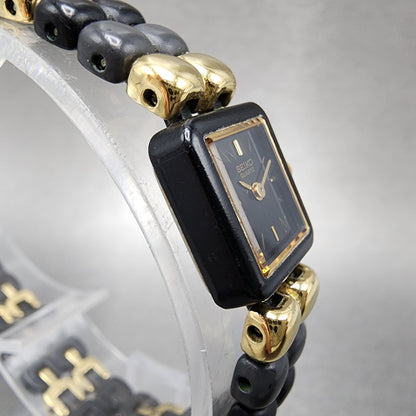 VTG Seiko Watch Women 14mm Black Dial Black Tone Rectangle 1E205540 New Battery3