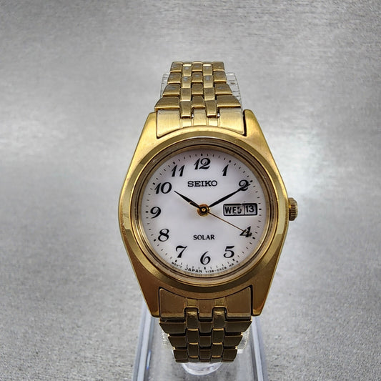 Seiko Solar Watch Women 26mm White Dial Gold Tone Daydate Round V138-0AA0 Runs