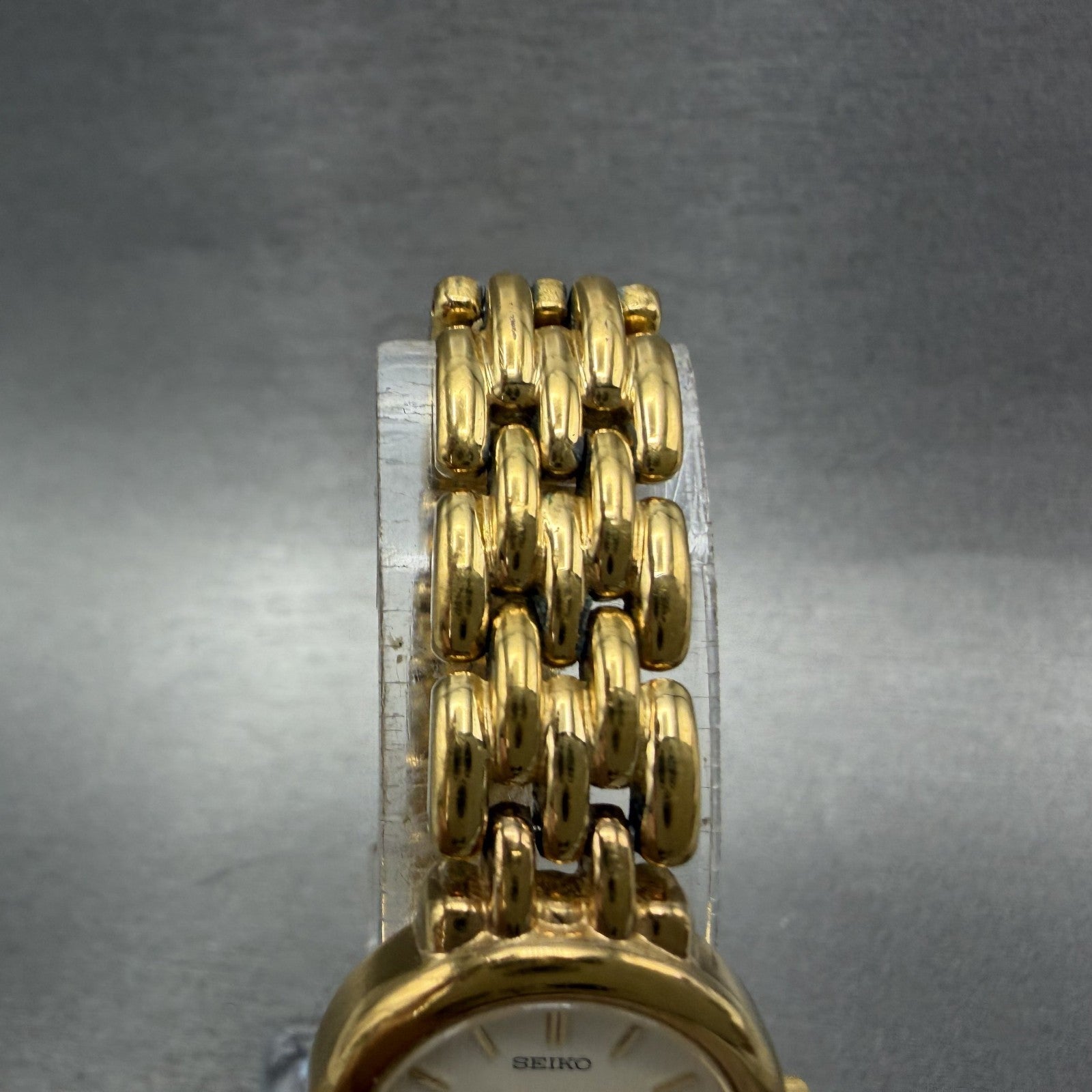 Seiko Watch Women 20mm White Dial Gold Tone Round V400-0990 New Battery ABC4