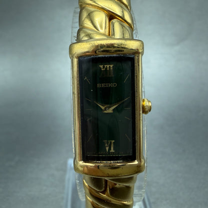 Seiko Tank Watch Women 13mm Green Dial Gold Tone Rectangle 2E20-7259 New Battery0