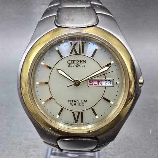 Citizen Eco-Drive Watch Men 36mm Cream Dial Titanium Daydate E100-K18442 PARTS0