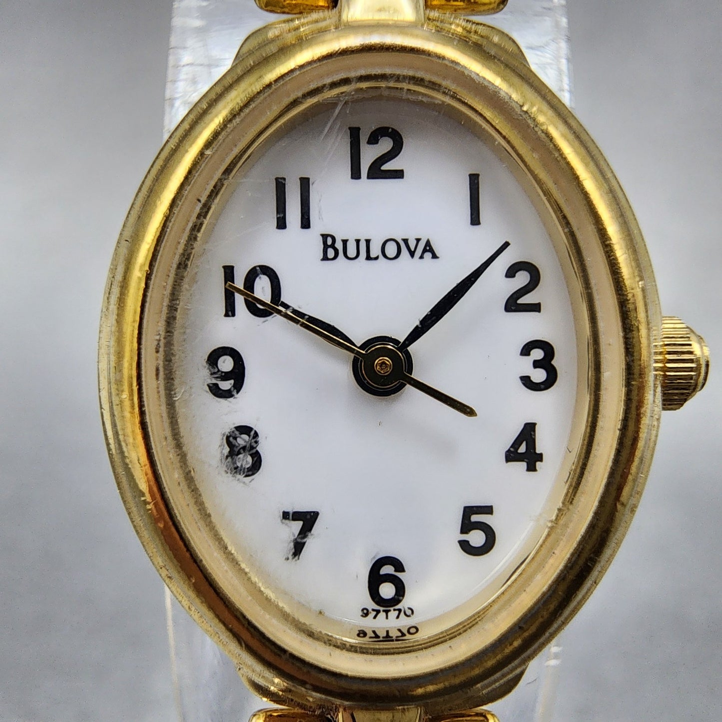 Bulova Watch Women 17mm White Dial Gold Tone Oval 97T70 New Battery1