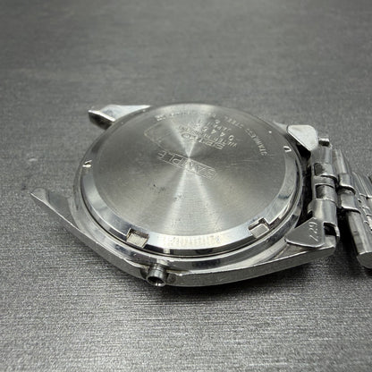 Seiko SQ Watch Men 35mm Silver Dial Silver Tone Daydate 8223-8049 SAMPLE E12