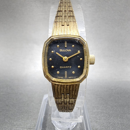 VTG Bulova Watch Women 16mm Black Dial Gold Tone Rectangle 6971 New Battery0
