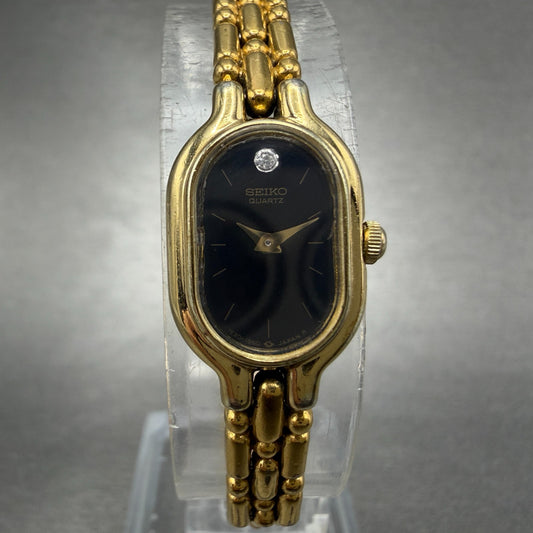 Seiko Watch Women 13mm Black Dial Gold Tone Oval 1e20-6039 New Battery Vinatge0