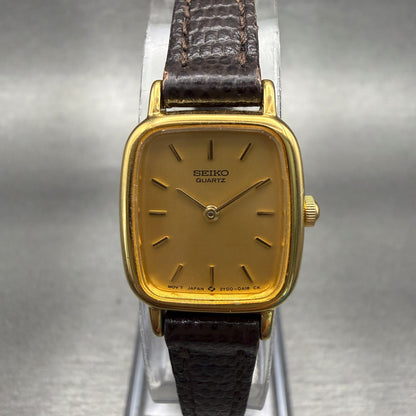 Seiko Watch Women 17mm Gold Dial Gold Tone Rectangle 2Y00-5A00 New Battery0