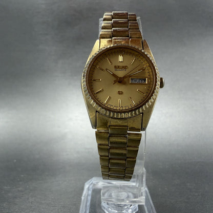 Seiko SQ Watch Women 24mm Gold Dial Gold Tone Daydate Round 3E23-0A60 NewBatt 5V5