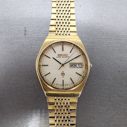 Seiko Lord quartz Watch Men 34mm Cream Dial Gold Tone Daydate 78537010 PARTS0