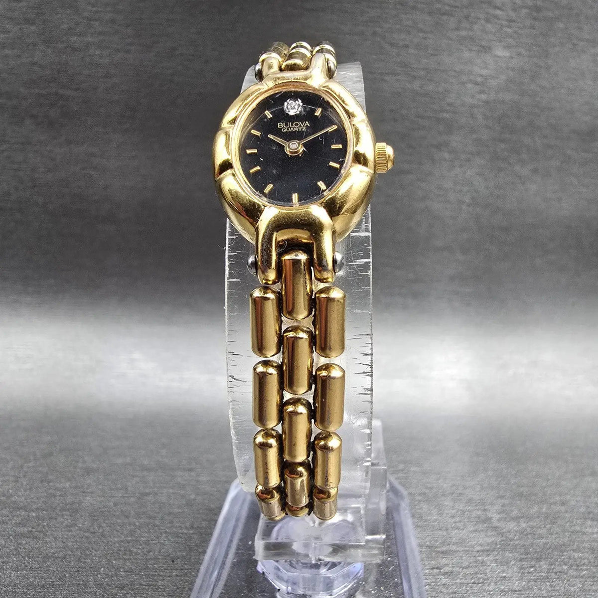 Bulova Watch Women 16mm Black Dial Gold Tone Oval 92F12 New Battery Diamonds VTG5