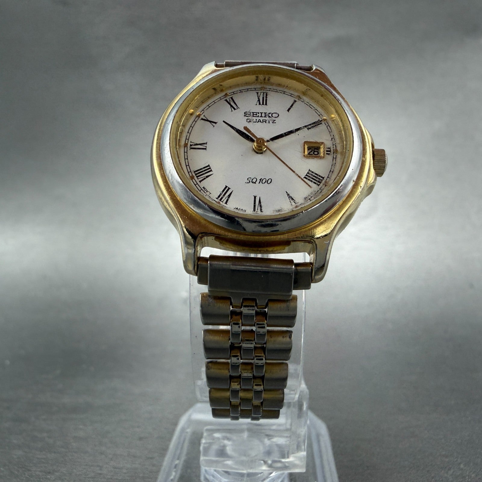 Seiko SQ 100 Watch Women 28mm White Dial Gold Tone Date 7N82-0061 New Battery5