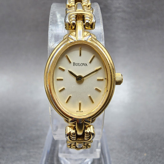 Bulova Watch Women17mm Champagne Dial Gold Tone Oval 97T09 New Battery0