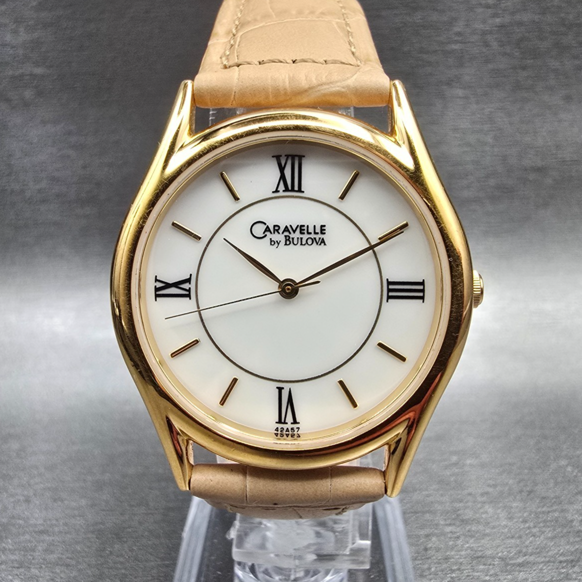Bulova Caravelle Watch Men 33mm White Dial Gold Tone Round 42A57 New Battery0