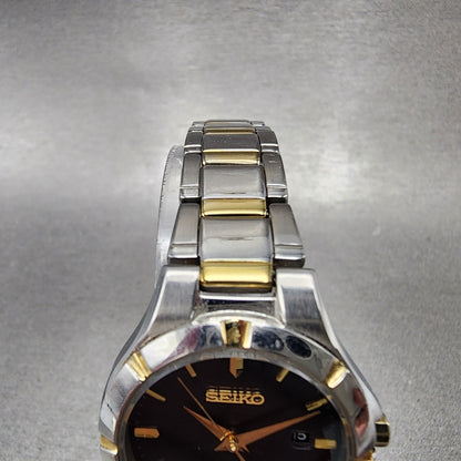 Seiko Solar Watch Women 27mm Black Dial Two Tone Date Round V1370CH0 Works4