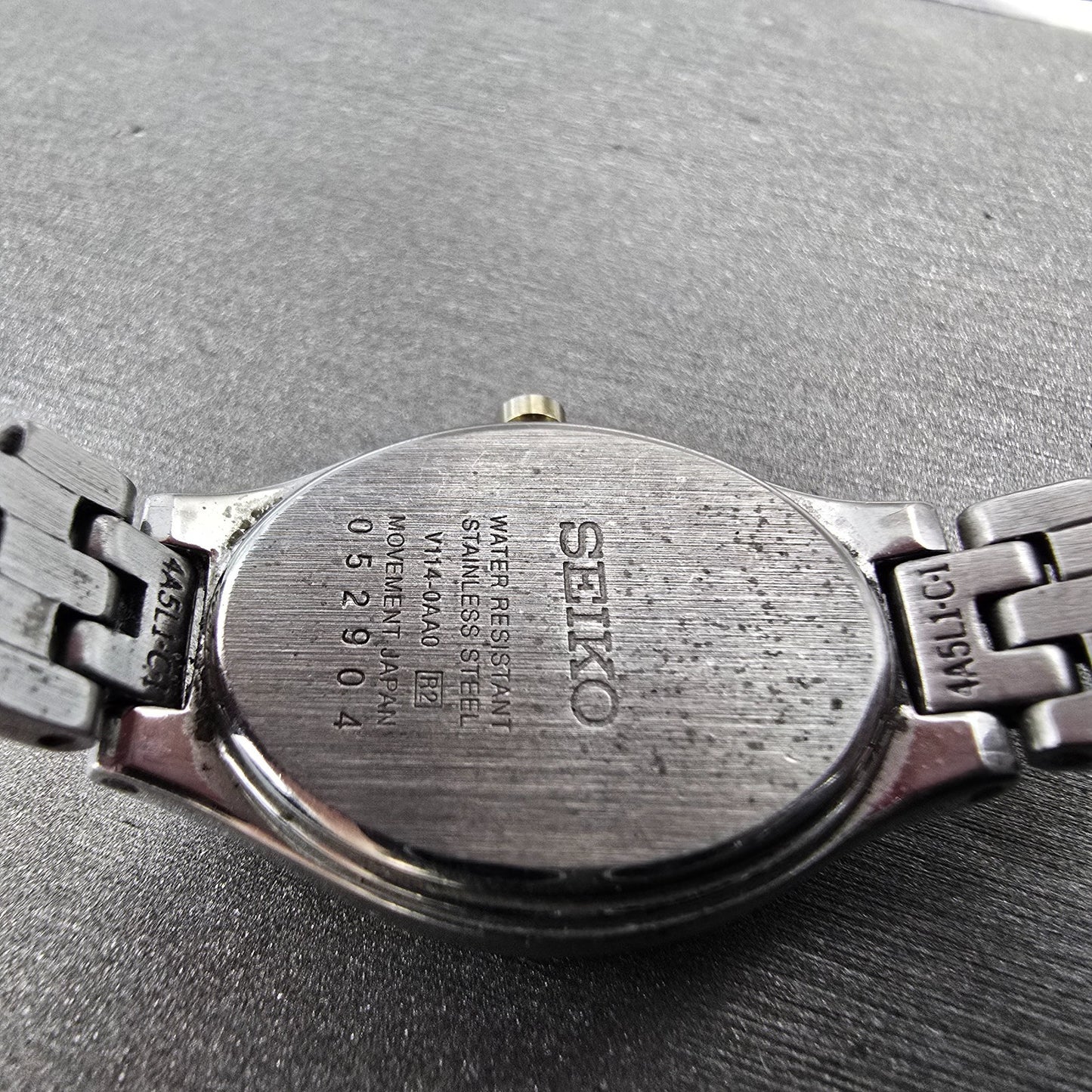 Seiko Solar Watch Women 20mm Black Dial Two Tone Oval V114-0AA0 Runs9
