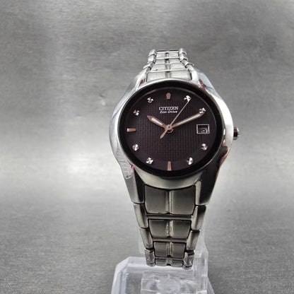 Citizen Eco-Drive Watch Women 25mm Black Dial Silver Tone Date E011-S058503 Runs5