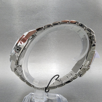 Silver stainless steel watch bracelet on display stand against gray background