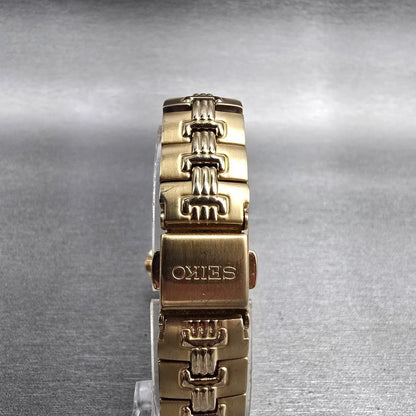 Seiko Watch Women 25mm Black Dial Gold Tone Date Diamonds 7N82-0DT0 New Battery7