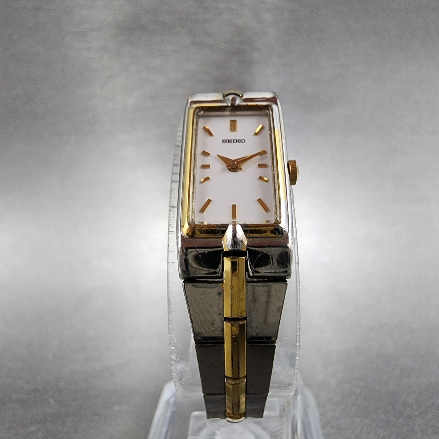 Seiko Watch Women 13mm White Dial Two Tone Rectangle 2E207479 New Battery C5675