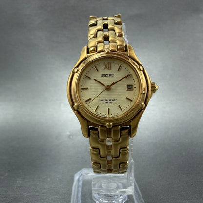 Seiko Watch Women 26mm Champagne Dial Gold Tone Date Round 7n82-0599 New Batt M65