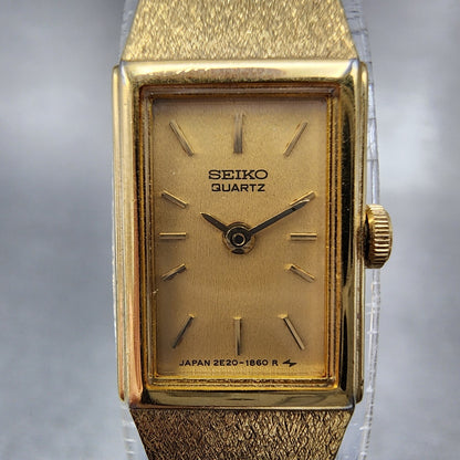 Seiko Tank Watch Women 12mm Gold Dial Gold Tone Rectangle 2E206479 New Battery1