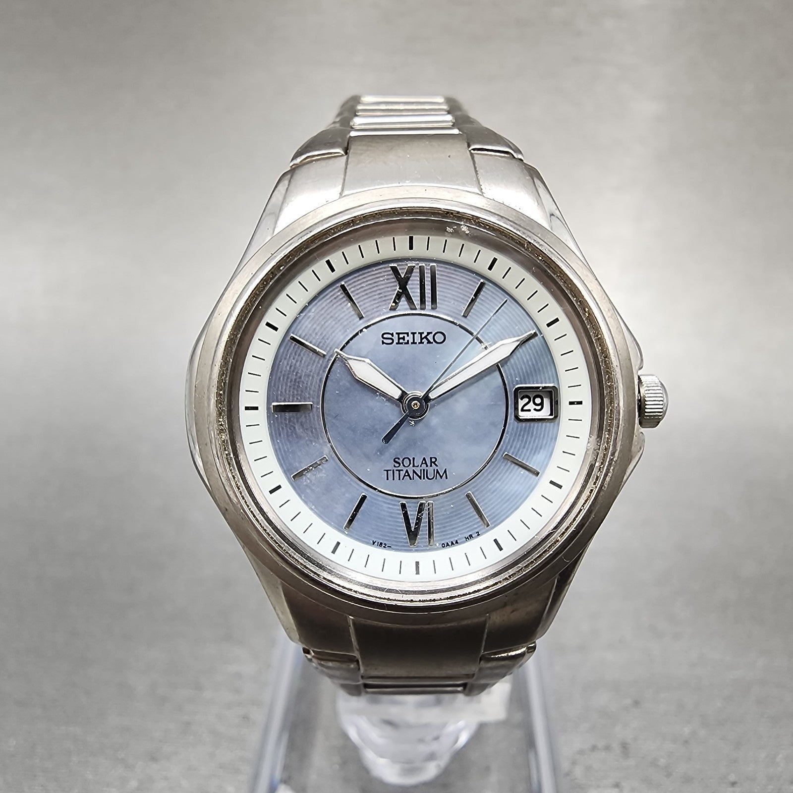 Seiko Solar Watch Women 29mm MOP Dial Titanium Date Round V1820AA0 Runs0