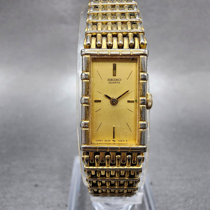 Seiko Tank Watch Women 12mm Champagne Dial Gold Tone 2e205079 New Battery0