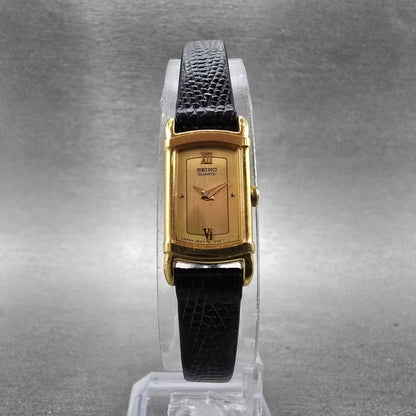 Seiko Tank Watch Women 12mm Champagne Dial Gold Tone 2E20-5969 New Battery VTG5