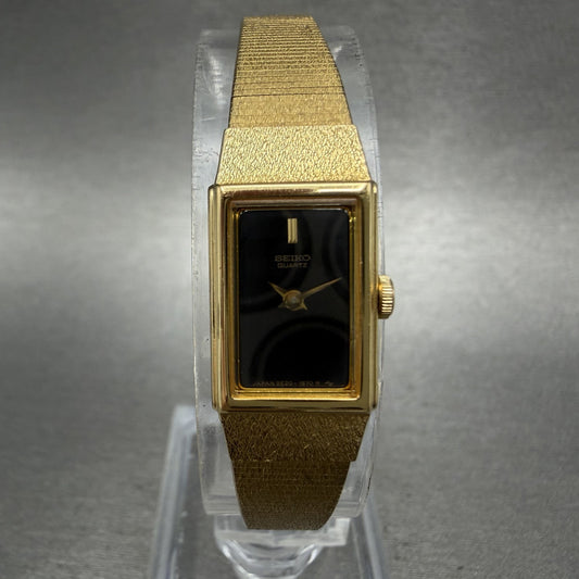 Seiko Tank Watch Women 12mm Black Dial Gold Tone 2E20-6479 New Battery VTG ABC0
