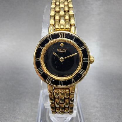 Seiko Watch Women 21mm Black Dial Gold Tone Round 1N000D29 New Battery0