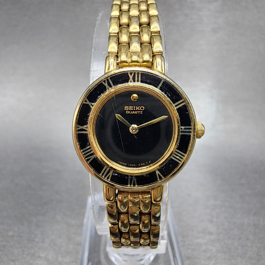 Seiko Watch Women 21mm Black Dial Gold Tone Round 1N000D29 New Battery0