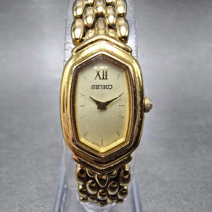 Seiko Watch Women 15mm Champagne Dial Gold Tone Oval Y150-5M89 New Battery VTG0