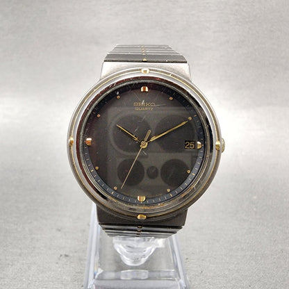Seiko Watch Men 33mm Black Dial Black & Gold Tone Round Date 74326050 New Batt0