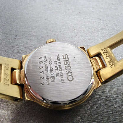 Seiko Watch Women 20mm Black Dial Gold Tone Round 1N000GM0 New Battery9