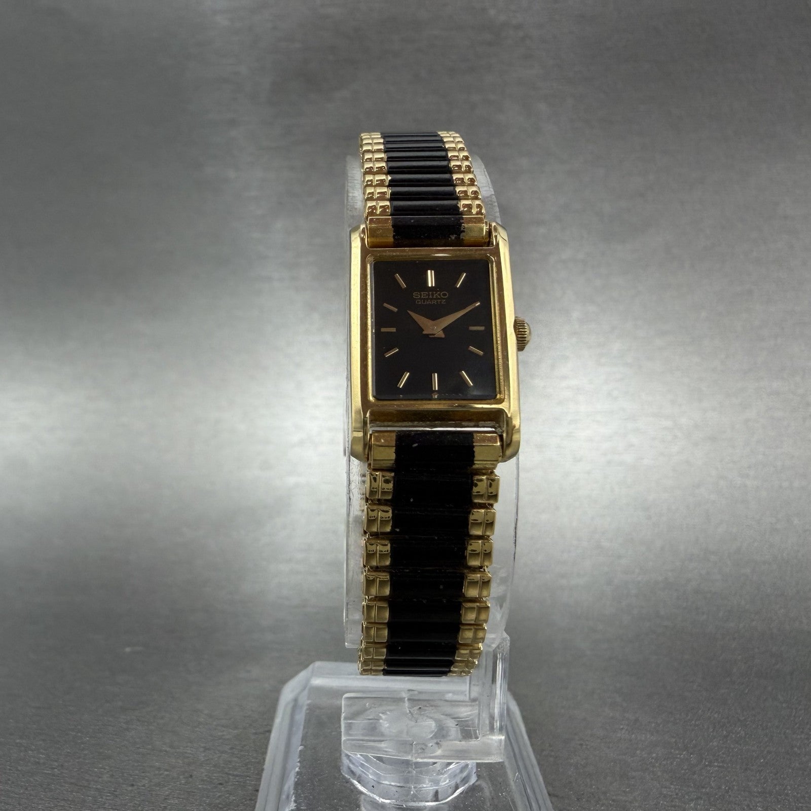 Seiko Tank Watch Women 14mm Black Dial Gold Tone Rectangle 1F20-5A69 New Batt TH5