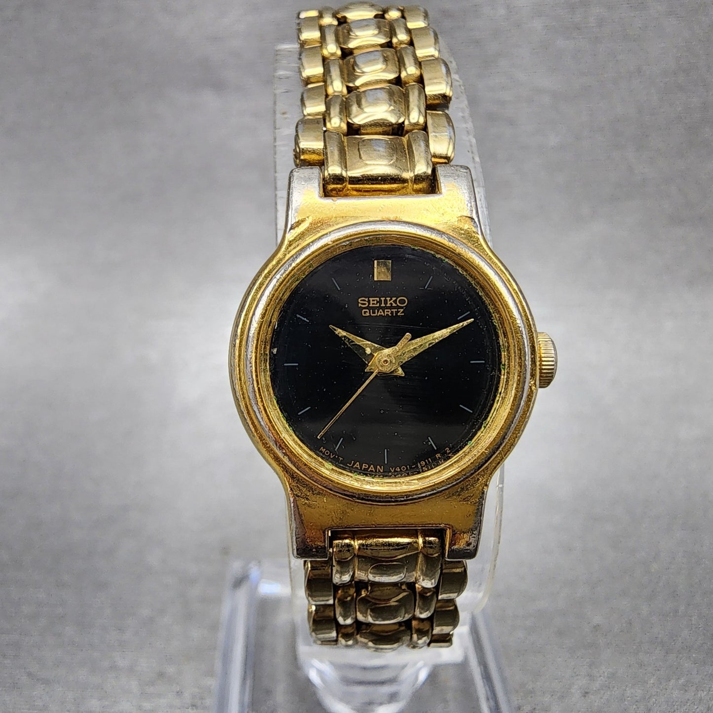 Seiko Watch Women 19mm Black Dial Gold Tone Round V4010518 New Battery0