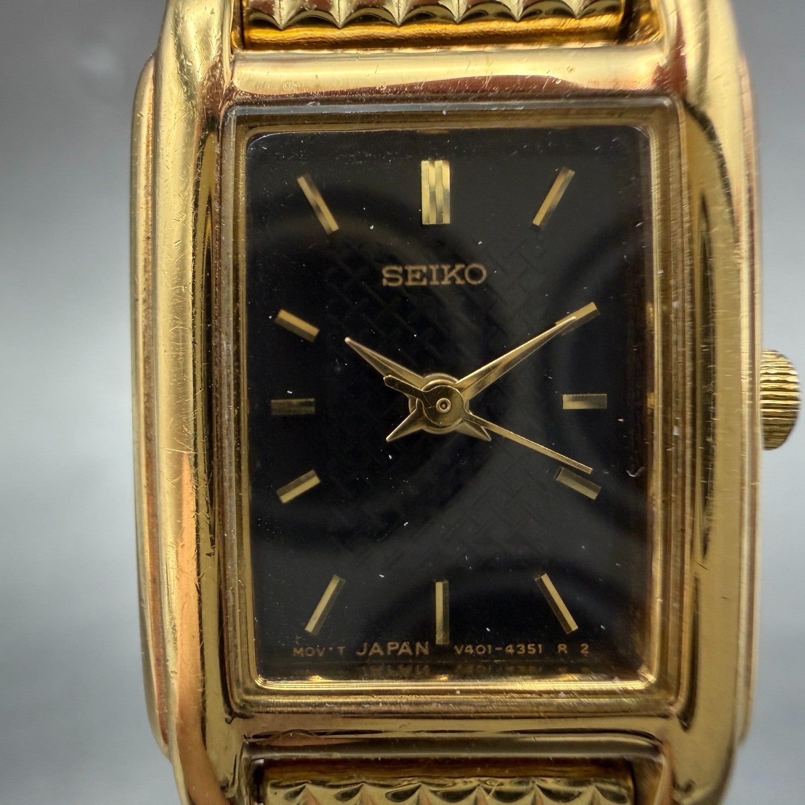 Seiko Tank Watch Women 18mm Black Dial Gold Tone Rectangle V401-5650 New Batt JO1