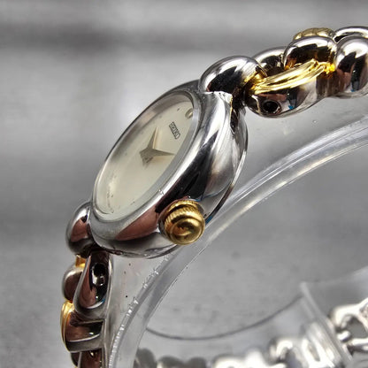 Seiko Watch Women 18mm Ivory Dial Silver Tone Round Y150-0M69 New Battery VTG2