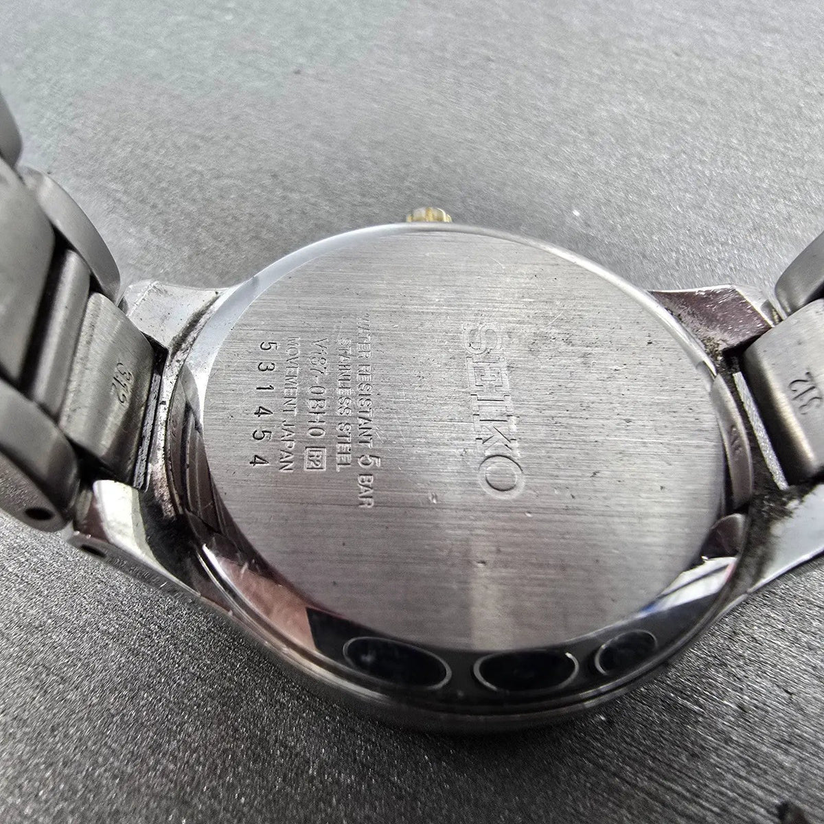 Seiko Solar Watch Women 29mm Silver Dial Two Tone Date Round V137-0BH0 Runs JP9