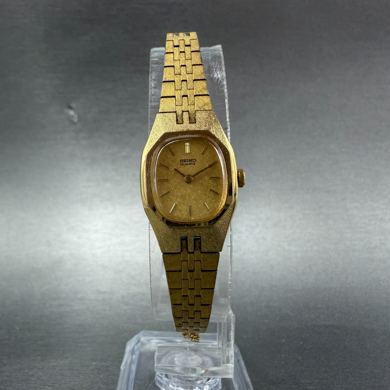 Seiko Watch Women 17mm Champagne Dial Gold Tone Rectangle 2C20-5749 New Battery25