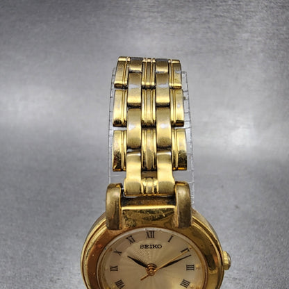 Seiko Watch Women 24mm Champagne Dial Gold Tone Round V7011781 New Battery VTG4