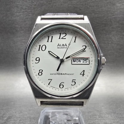 Seiko Alba Watch Men 34mm Silver Dial Silver Tone Daydate V743-8A10 New BatteryX0