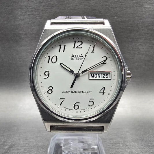 Seiko Alba Watch Men 34mm Silver Dial Silver Tone Daydate V743-8A10 New BatteryX0