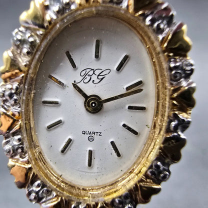 Unbranded Watch Women 17mm White Dial Gold Tone Gem Set Bezel Oval New Battery1