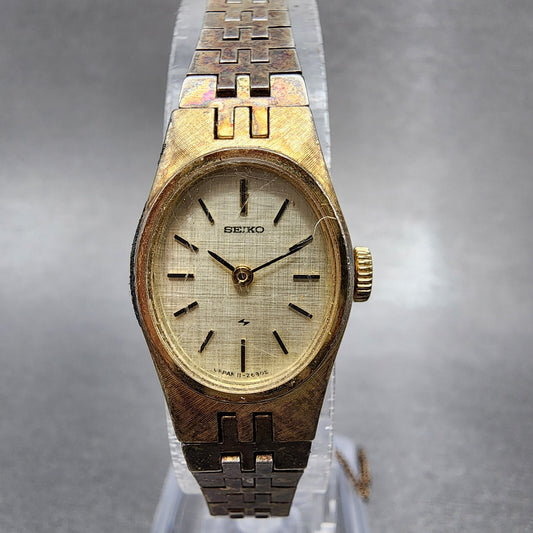 Seiko Watch Women 17mm Champagne Dial Gold Tone Manual Wind Oval 11-7849  Runs