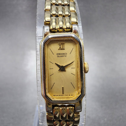 Seiko tank Watch Women 12mm Champagne Dial Gold Tone 2e206389 New Battery0