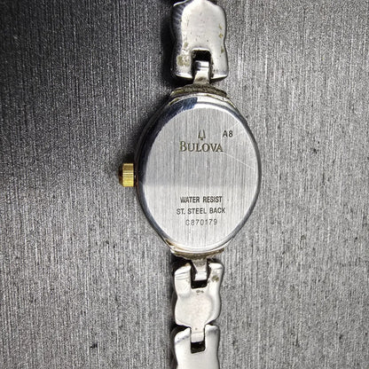 Bulova Watch Women 17mm White Dial Two Tone Oval 98L66 New Battery10
